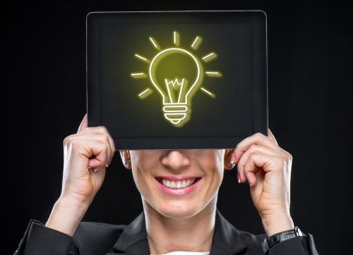 new idea for SEO - woman with lightbulb